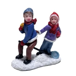 Kerstdorp>Kerstdorp spelende kinderen